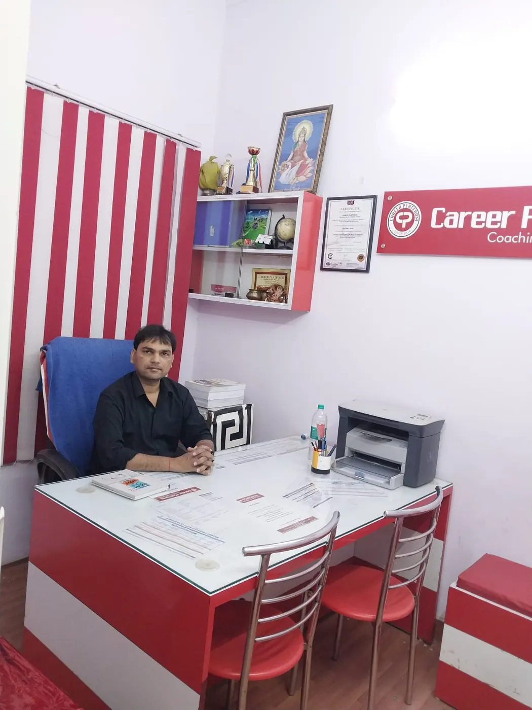 Career Platform director at his office desk